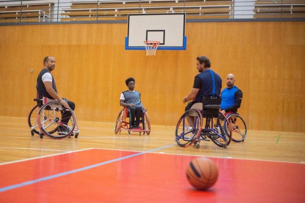 Men in Wheelchair Playing Basketball